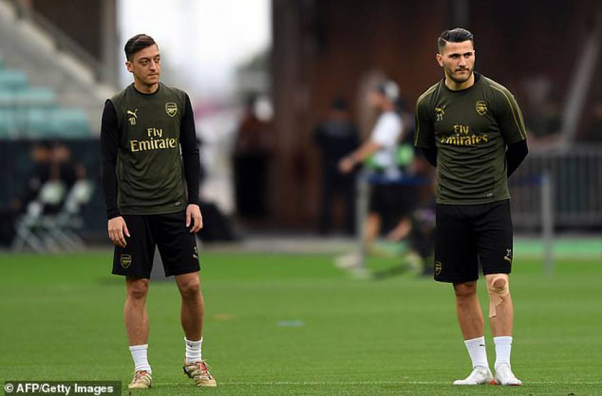 Arsenal fear security threat may prevent Mesut Ozil and Sead Kolasinac from playing more games with pair caught up in ongoing gang war