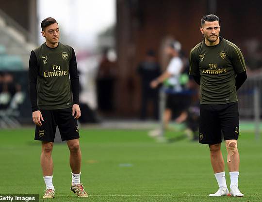 Arsenal fear security threat may prevent Mesut Ozil and Sead Kolasinac from playing more games with pair caught up in ongoing gang war